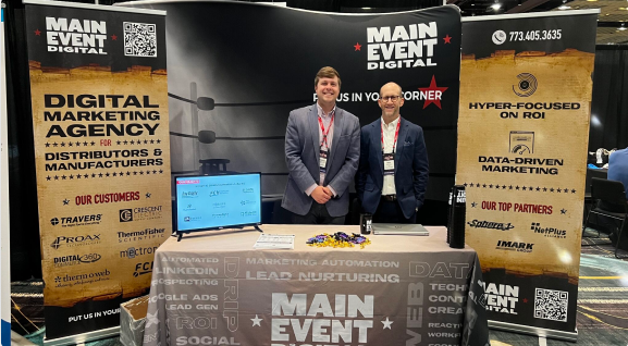 Mike Mayer and Donovan Morrison at the Main Event Digital conference booth.